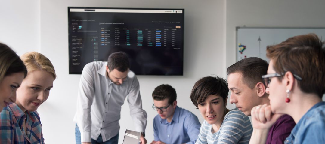 Business Team Meeting at Boardroom Table Brainstorming