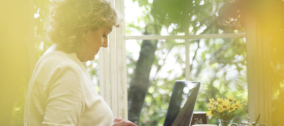 woman working at home but outside