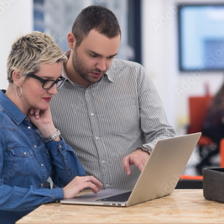 Two People Engaging in Work